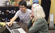 Cynthia K. Thompson, Ph.D., works in her office.